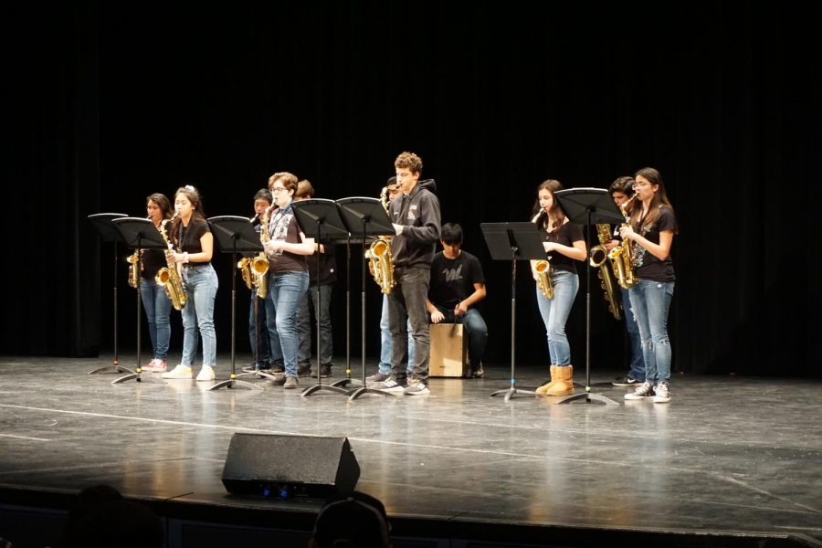 Members of the Saxophone Choir perform a self-arranged set, representing the SCHS Marching band.