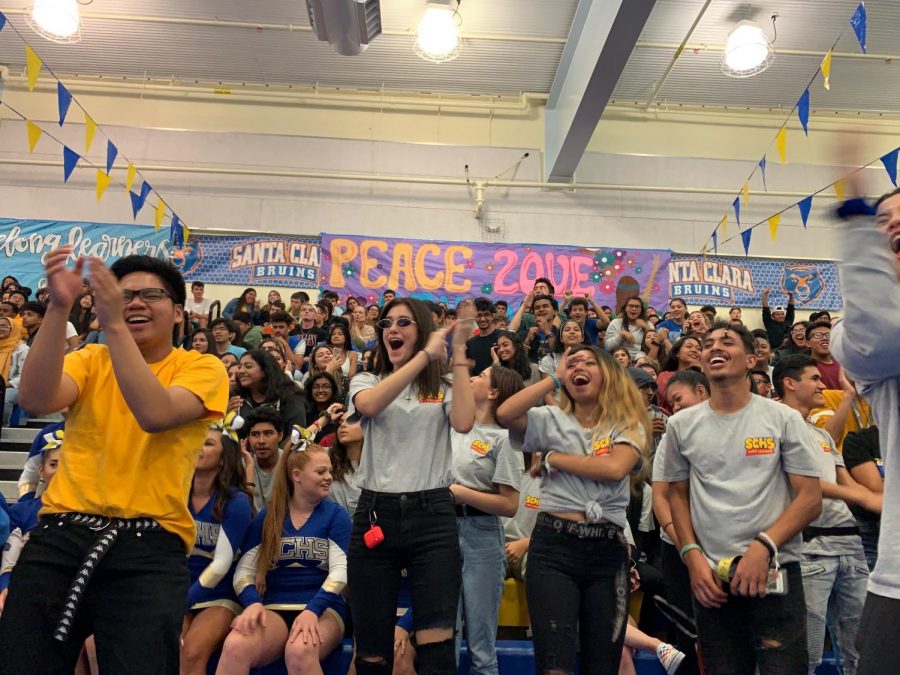 Seniors (left to right) Dion Celino, Jordenne Schilling, Franchesca Poquiz and Ben Carter, cheer on their classmates at the first ever Welcome Rally. 