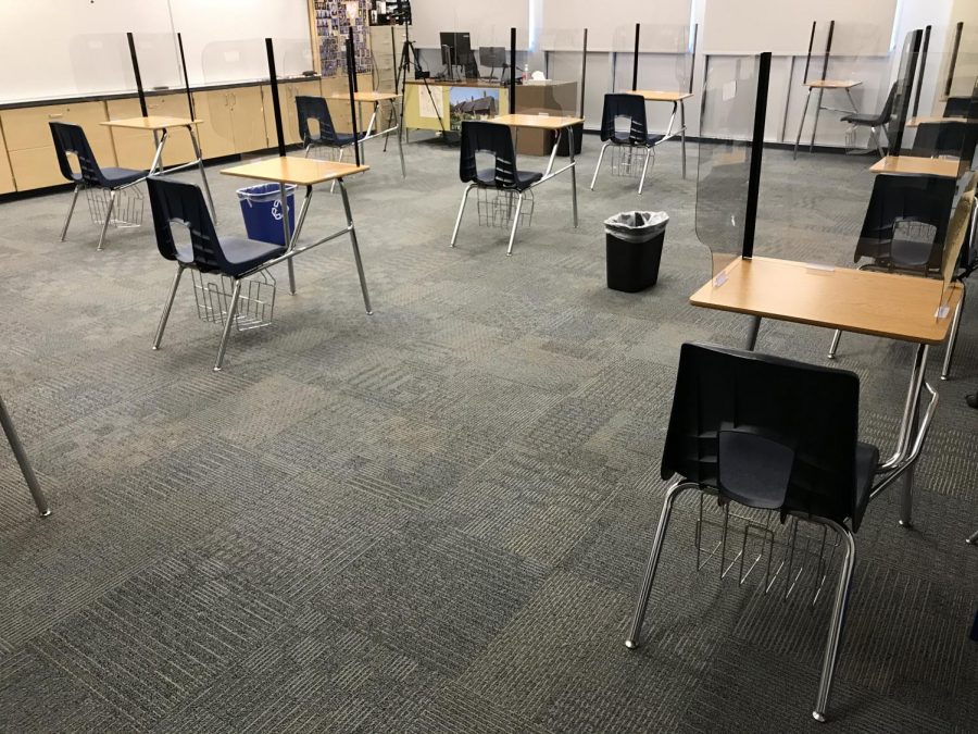Desks and classrooms are set up for social distancing.