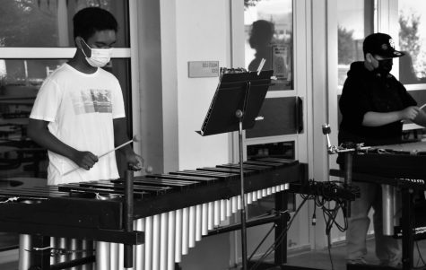 Two students in the percussion section shown during sixth period Symphonic Band.