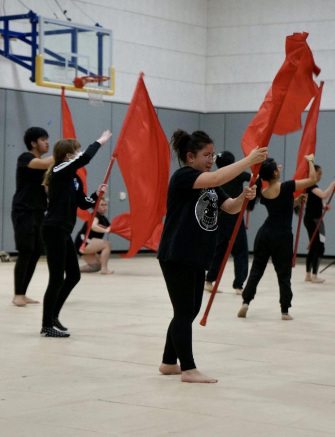 SCHSs winter guard performance as inspired by the movie Psycho as dancers twirl red flags to resemble blood.