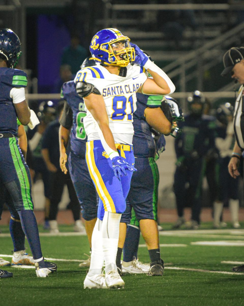 Senior Andrew Castillo celebrates after a play at MacDonald High School on Aug. 30, 2024.