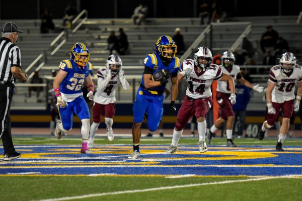 Senior Gabriel Chavez runs the ball past Fremont defenders at Santa Clara High School on Oct. 18, 2024.