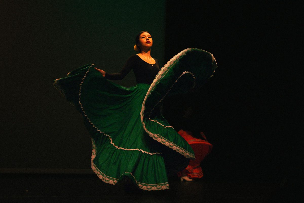 Senior Ariana Aviles performs folklorico during the Raza Latina presentation on Oct. 28, 2024.