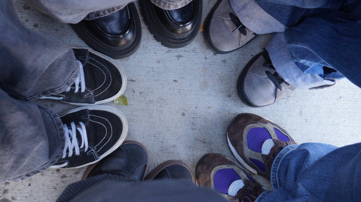 Various shoes are worn on campus.