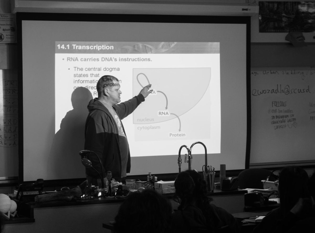 Science teacher Eric Wozadlo presents his daily lesson to class.