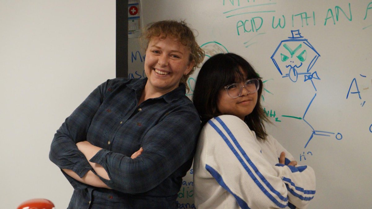 Science teacher Arielle Martinka (left) ensures her TA senior Ysabella Vizconde (right) has a productive time in her class.
