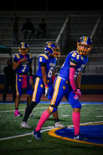 Senior Nolan Gallo, junior Joshua Perez and senior Damian Lopez get into formation for their play at Santa Clara High School’s football game against Los Altos on Oct. 9, 2025.