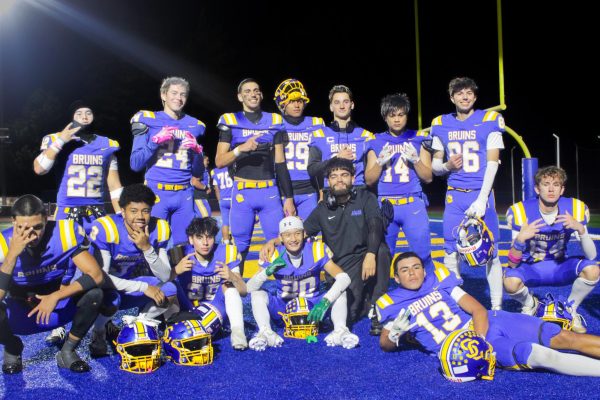 Bruins pose after their homecoming win against South San Francisco High School Warriors.