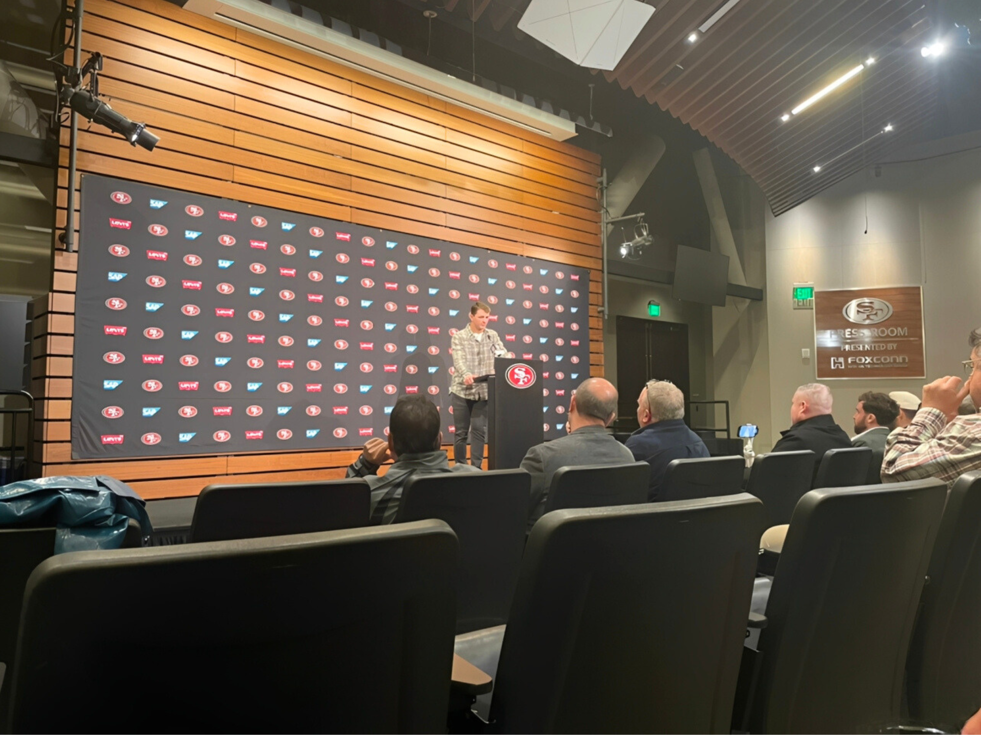 Quarterback Brock Purdy answers questions during the post-game 49ers press conference.