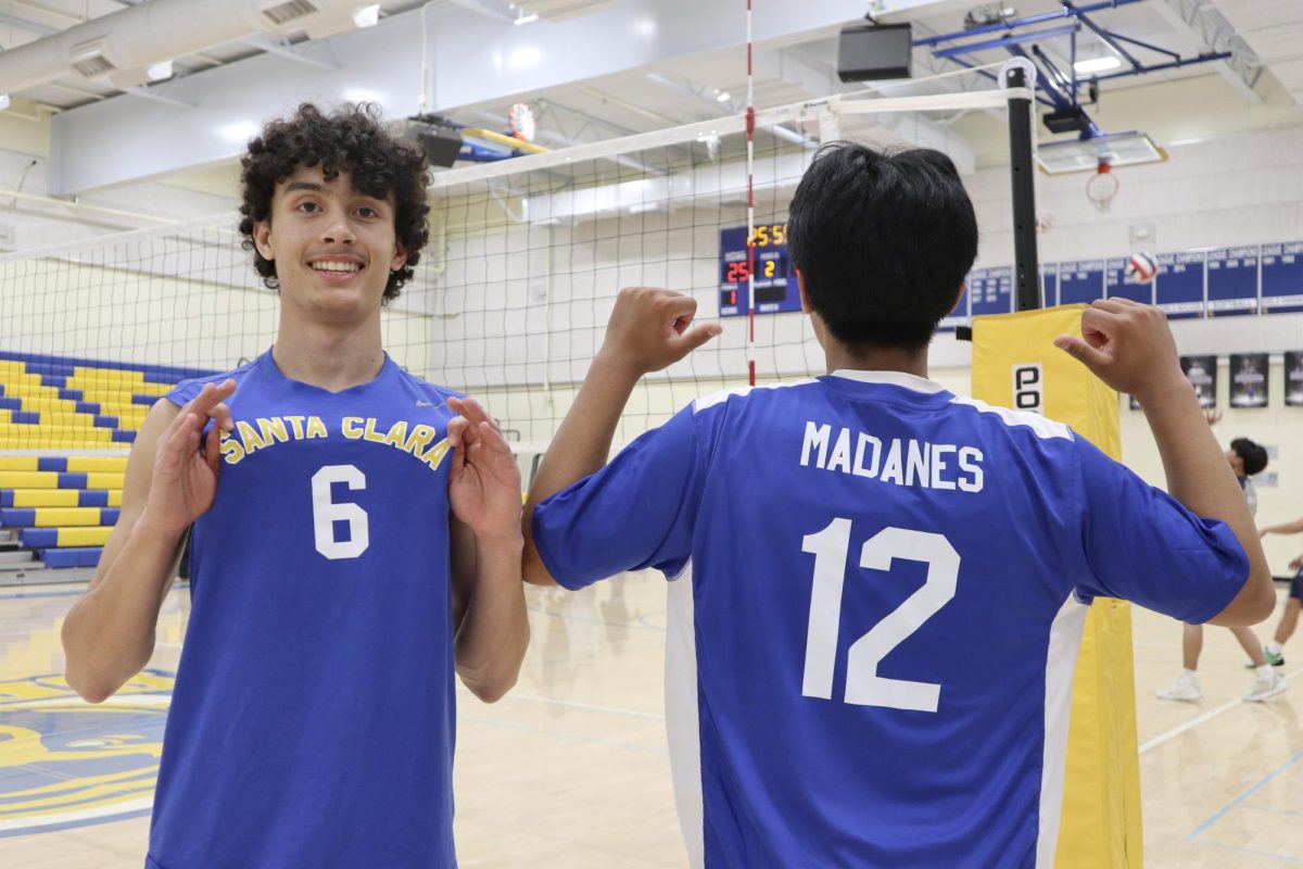 Juniors, varsity player Gabriel Vieira (left) and JV player Noah Madanes (right), explain the differences between their teams.